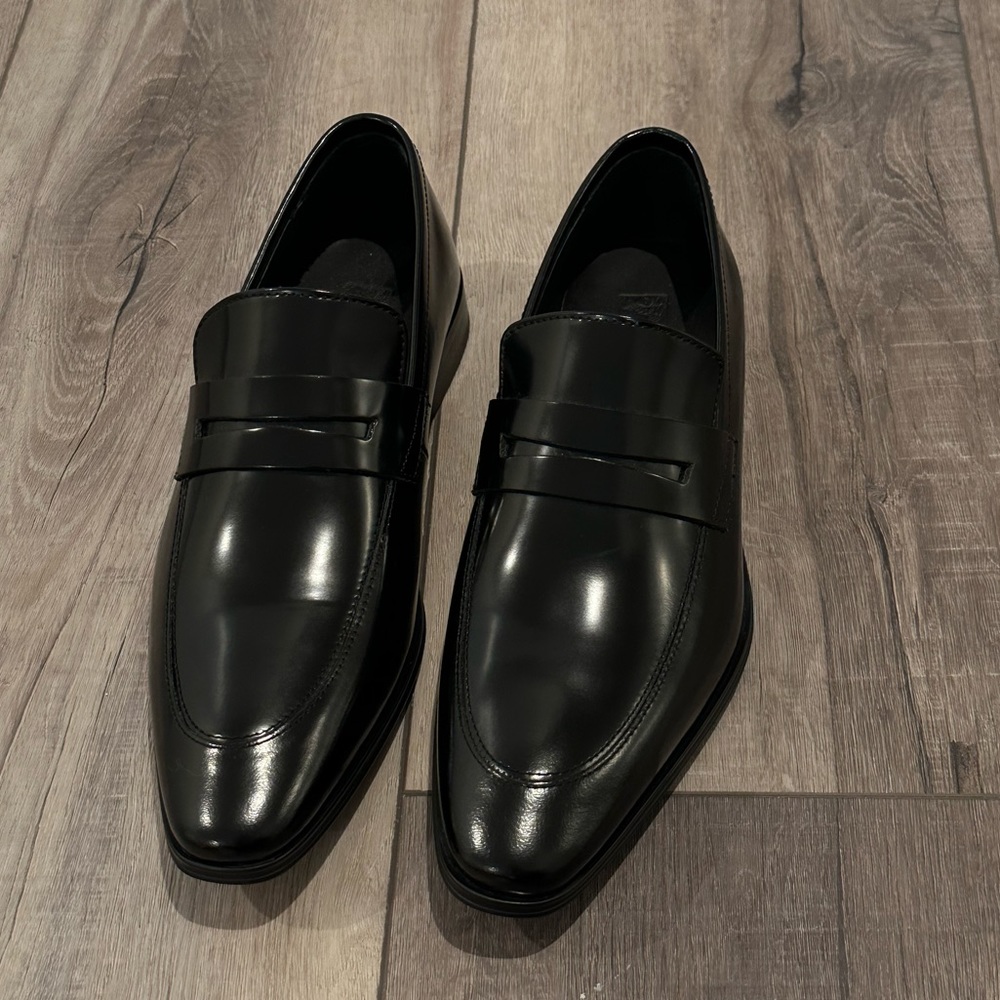 Versace patent leather penny loafer.